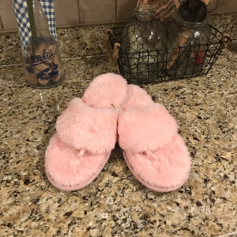 Pastel pink fur slippers